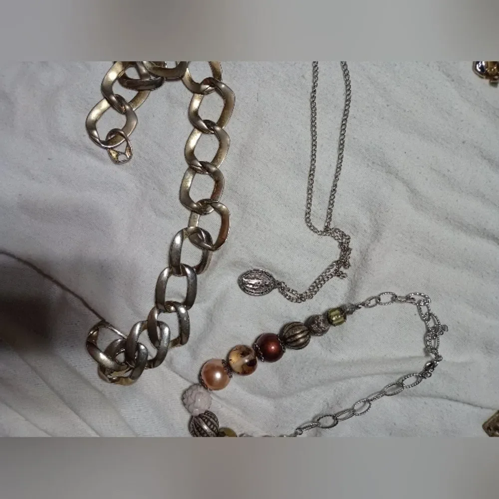 Lot of three quality costume necklaces, one is the Virgin Mary (C022)
